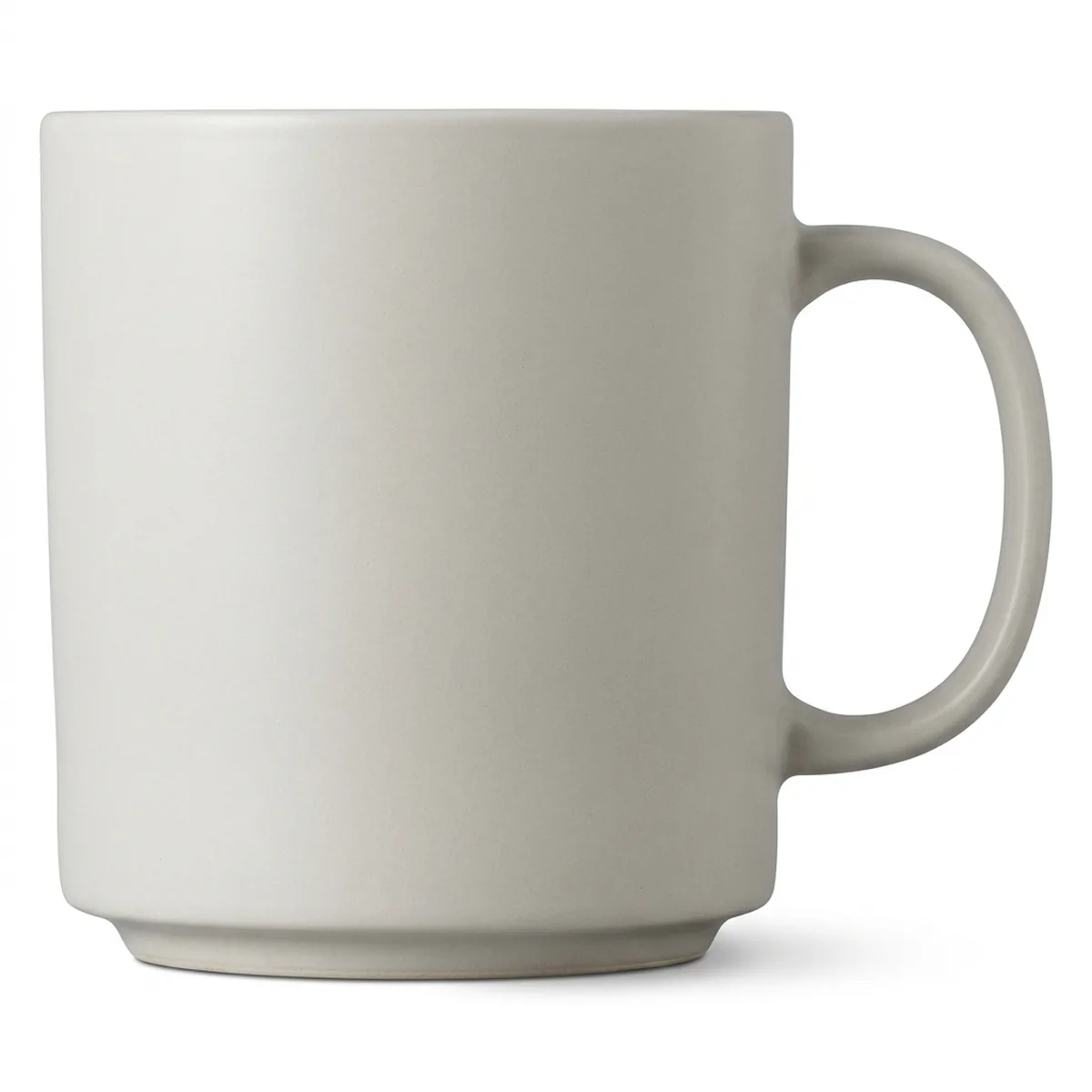 A plain ceramic mug in side view, handle to the right, nothing printed on the body.