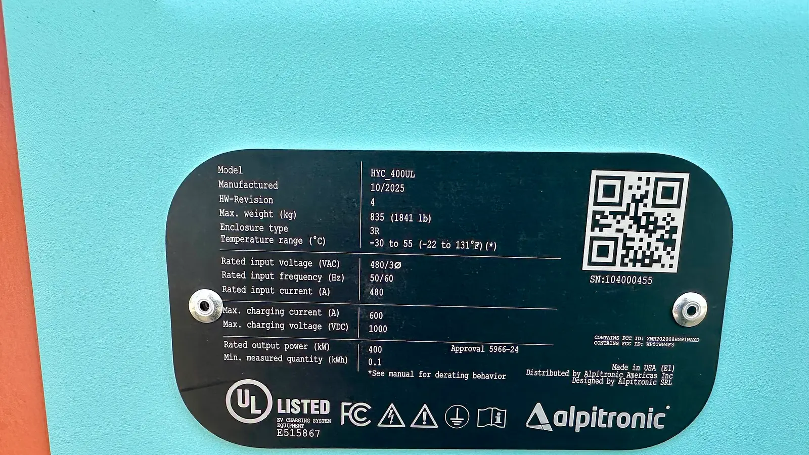 Alpitronic rating label with UL and FCC marks and voltage and current ratings
